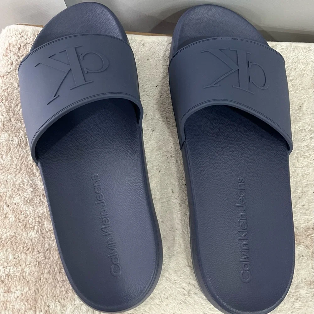 Calvin Klein Medium Gray Embossed CK‎ Slide Sandals